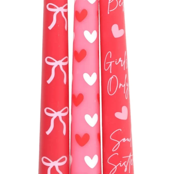 4-42.webp Set of 3 Girl Gang Bow and Heart Taper Candles