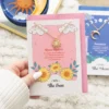 S03723290_15 The Sun Celestial Rose Quartz Necklace Card