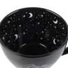 Celestial Black Ceramic Cup - Crescent Moon and Star Design A black ceramic cup with white crescent moons and stars on a glossy night-sky interior.