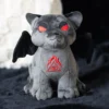 Gothic Cat Gargoyle Plush Toy - Gray Velvet with Red Eyes How to build Halloween hampers. Gothic gifts for gothic friends A gray cat-gargoyle plush with red eyes, black bat wings, and an embroidered red symbol.