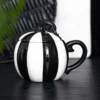 main-355.webp Black and White Striped Pumpkin Lidded Mug