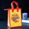 main-421.webp Eat Your Worries Lunch Bag by Steven Rhodes