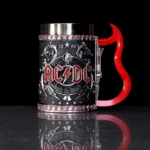 AC/DC black stainless steel mug with red devil-tail handle and embossed band logo design.