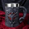 Gothic Goat Head Mug Stainless Steel Black - Horn Handle Pentagram A gothic mug with a goat head, pentagram, and horn handle on red velvet fabric.