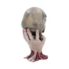 Macabre Hand Sculpture Resin Art Pale Grip With Locked Skull A pale human hand gripping an aged skull with a metal lock embedded in its surface.