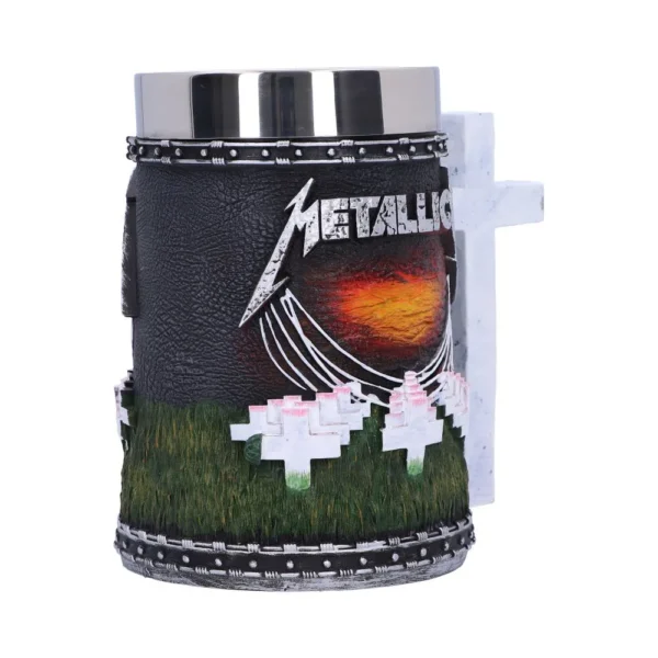Metallica Black Stainless Steel Mug - White Crosses and Sunset A black Metallica mug featuring white crosses, fiery sunset, and metallic studded details.