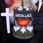 A Metallica-themed metal tankard with fiery sunset and white crosses inspired by Master of Puppets.