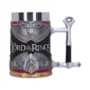 A detailed Lord of the Rings tankard with sword handle and silver, gold, and chainmail design.