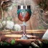 Elven Fantasy Goblet Wooden Chalice - Green Cloth and Gold Ring Fantasy-style goblet with elven leaf brooch and golden ring on wooden surface surrounded by greenery.
