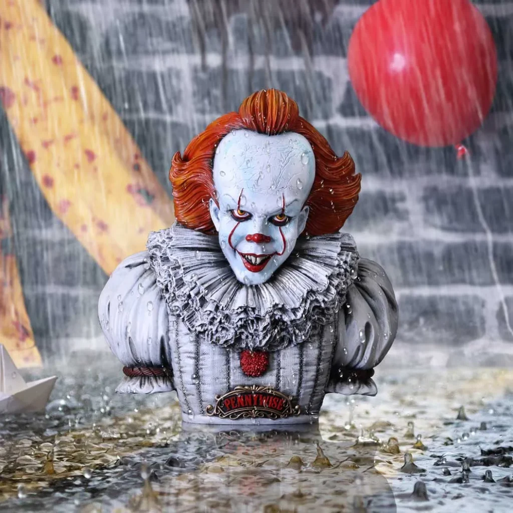 15 Best Halloween Gift Ideas for 2026 2 Best Halloween Gift Ideas A realistic IT Pennywise clown bust with orange hair and yellow eyes, wearing a ruffled grey suit.