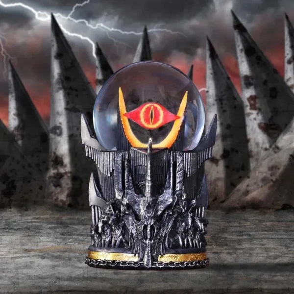 Fiery Eye Gothic Orb Figurine Statue - Black Metal Spiked Base A fiery red eye encased in a dark gothic orb atop a detailed spiked base.