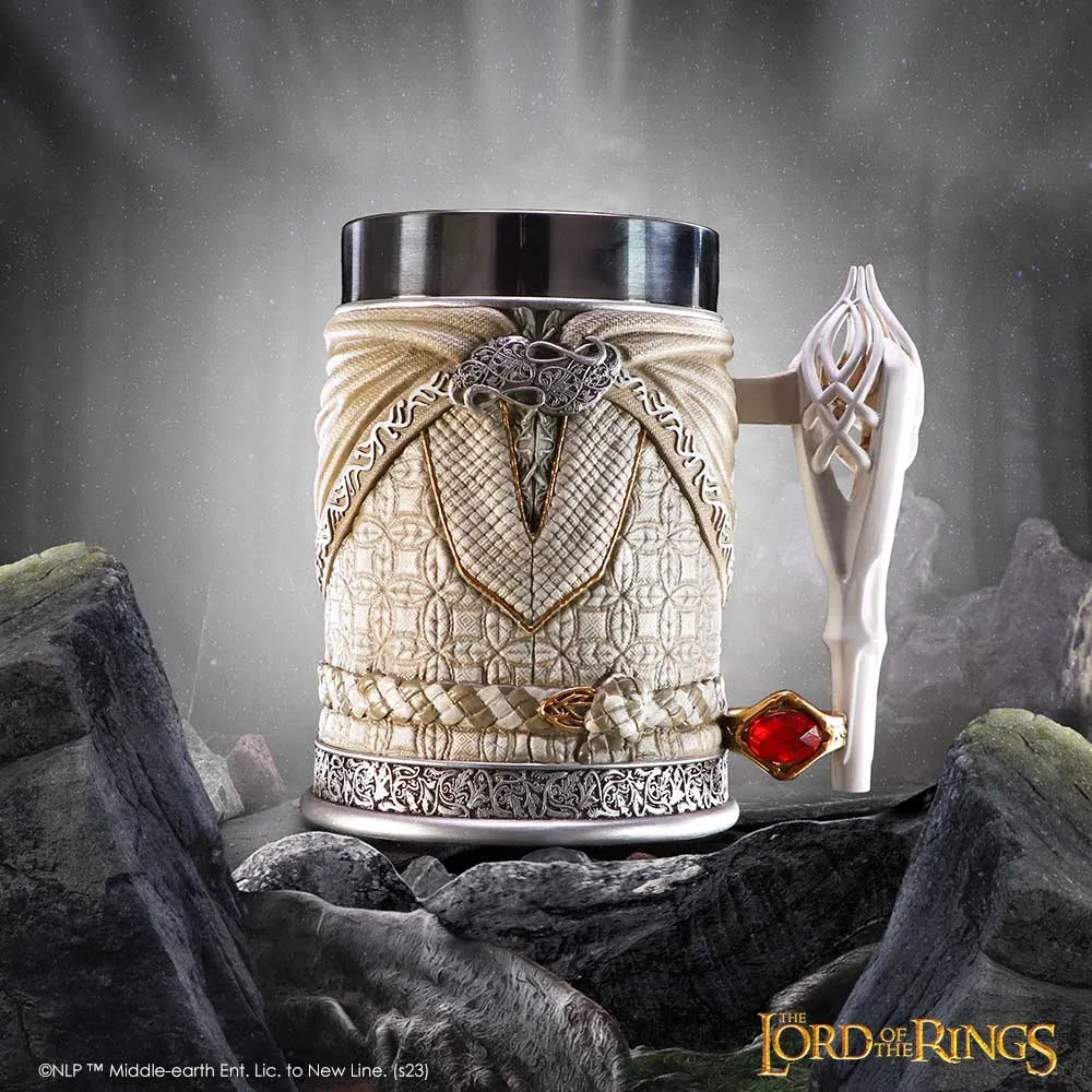 An ornate ivory Elven-inspired Lord of the Rings mug with gold details and a red gem.