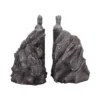 Stone King Statues Bookends Gray - Ancient Guardian Design Two stone king statues carved into rocky cliffs facing each other like ancient guardians.