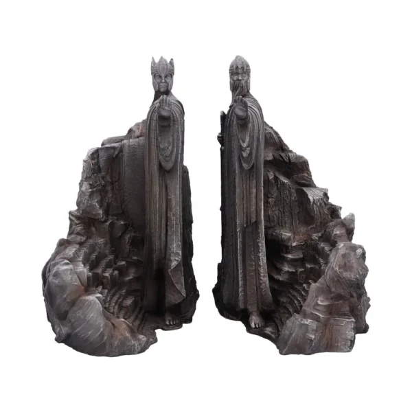 Stone King Statues Gray Cliff Sculptures - Majestic Guardians Two towering stone statues of robed kings with raised hands carved into rocky cliffs.