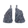 Ancient Guardian Statues Stone Sculpture Gray Moss Details Two ancient stone guardian statues carved into rocky cliffs with moss and weathered details.