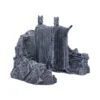 Stone King Statues Sculpture Gray Cliffside - Majestic Guardians Two massive stone statues of robed kings carved into a rocky cliffside.