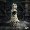 A gothic figurine of Victoria Everglot holding dark roses in a dim graveyard setting.