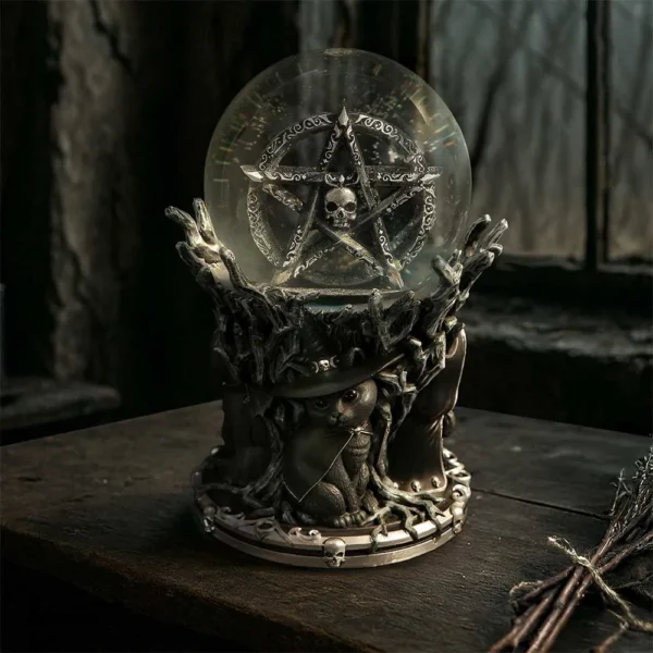 Crystal Ball Glass Orb Dark Wood Base With Pentagram Skull A mystical crystal ball with a pentagram and skull on a wooden table with a witch cat.