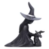 Witch and Pet Figurine Resin Sculpture - Black Silver Accents Black witch figurine kneeling beside small pet in matching hat, matte finish with silver accents.