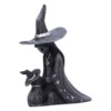 Whimsical Witch and Cat Sculpture Matte Black Silver Accents A black witch kneeling beside a black cat, both wearing silver-accented hats and charms.