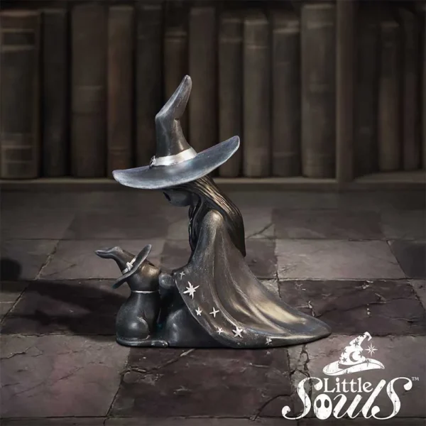 Little Witch and Bunny Figurine - Dark Metal Magical Duo Metal witch figurine with matching bunny companion in a mystical library setting.
