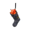 Dark Fantasy Christmas Stocking Ornament Black Leather Fiery Eye A dark fantasy Christmas stocking ornament with dragon skin texture and a fiery glowing eye.