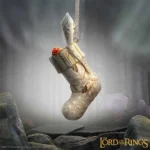 A beige quilted Christmas stocking ornament inspired by The Lord of the Rings with Elven details.
