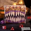 Dungeons & Dragons Monster Wallet Leather Purple Glow Eyes A fantasy-themed wallet shaped like a Dungeons & Dragons monster with teeth, eyes, and dice nearby.