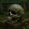 Occult Carved Human Skull Bone Artifact - Ivy and Moss Detail A carved human skull with ivy growing over it on mossy stone ruins in nature.