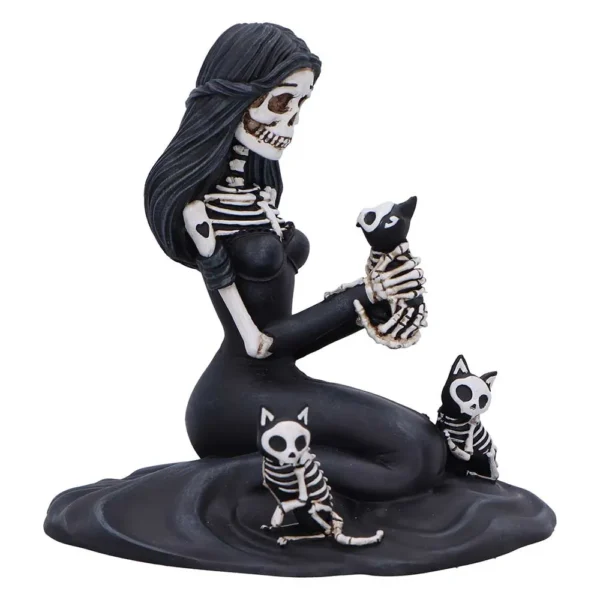 Gothic Skeleton Woman Sculpture Black Resin With Three Cats A gothic black-and-white sculpture of a skeletal woman kneeling with three skeletal cats.