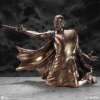 Bronze sculpture of Voldemort the wizard kneeling and casting a spell with a wand against a dark background.