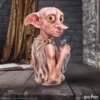 Dobby House-Elf Resin Statue - Grey Finish With Freedom Sock Officially Licensed Merchandise Detailed Dobby house-elf resin statue holding a grey freedom sock in a castle setting.