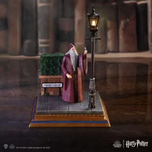 Albus Dumbledore collectible figurine under glowing streetlamp at Privet Drive from Harry Potter.