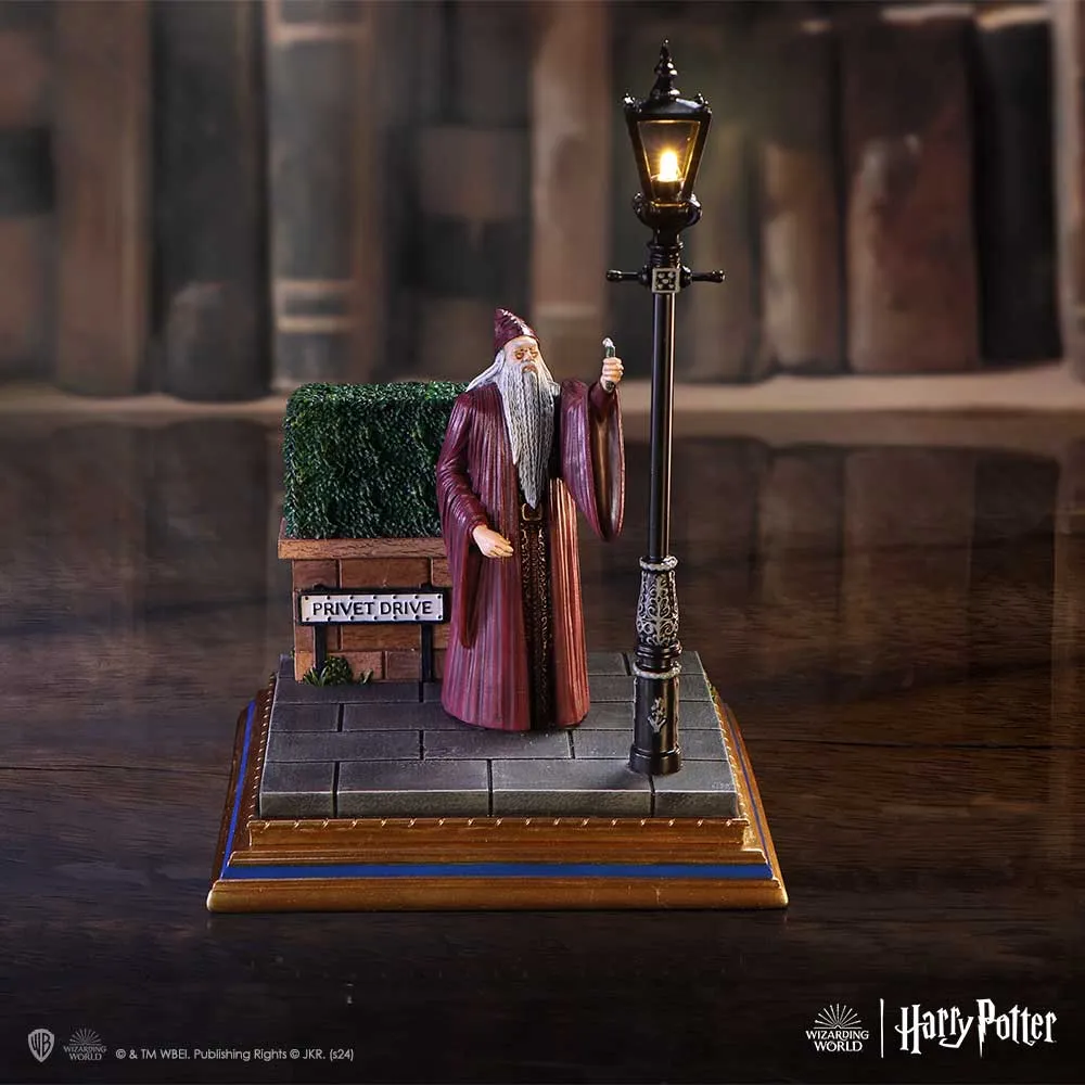 A Guide to Gifting Fandom Homeware 2 Albus Dumbledore collectible figurine under glowing streetlamp at Privet Drive from Harry Potter.