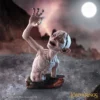 Gollum Resin Statue Gray Collectible - Holding The One Ring Lord of the Rings Gollum Bust. Gollum gray resin statue holding the One Ring over a dark Mount Doom landscape.