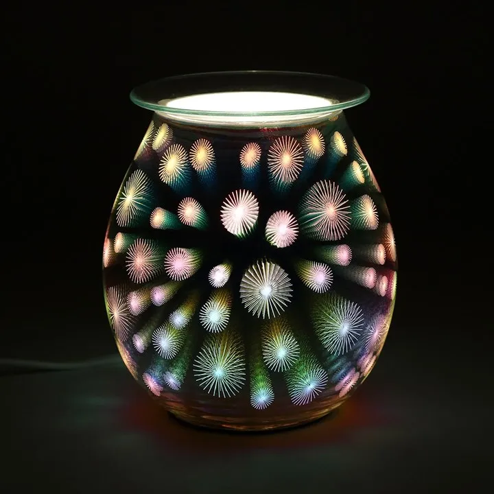 Tea Light Burner vs Wax Burner: Which Suits You? 3 Tealights vs electric burners: Colourful 3D glass electric aroma lamp glowing with starburst light patterns on a dark background.