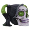 Green-Eyed Resin Skull Decor - Black Hair With Purple Detail White resin skull with green glitter eyes, black and green ponytails, and purple gothic details.