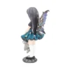 Gothic Fairy Figurine Resin Statue Teal Dress With Teddy Bear A gothic fairy figurine with purple wings holding a worn teddy bear on a skull-decorated base.