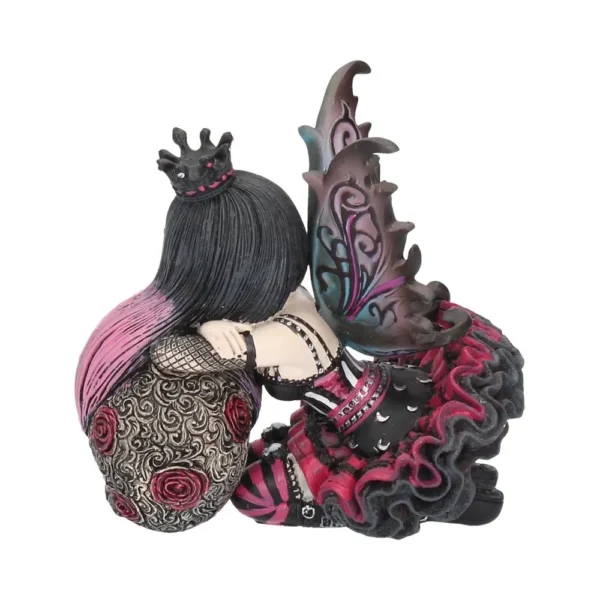 Gothic Fairy Figurine Resin Statue - Magenta Hair And Dark Wings A gothic fairy figurine with dark wings and magenta hair sitting in a sorrowful pose.