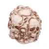 Human Skull Sphere Sculpture - Bone Finish With Fused Skulls A spherical sculpture made of fused human skulls with aged bone coloring and detailed texture.