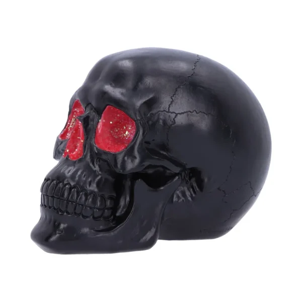 Black Resin Skull Sculpture - Red Glitter Eyes and Cracked Finish A glossy black skull with red glitter-filled eye sockets and detailed cracks on its surface.