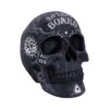 A black decorative skull with white spirit board designs and mystical sun-moon symbols.