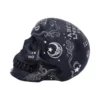 Black Matte Skull Sculpture - Ouija Design with Moon Motif Black decorative skull with white Ouija board letters, crescent moon, and ornate mystical patterns.