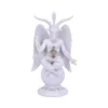 A white Baphomet statue with goat head, wings, and symbolic alchemical gestures.