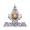Assassin’s Creed Silver Metal Sculpture - Golden Orb Centerpiece Silver Assassin’s Creed insignia sculpture with golden orb centerpiece and engraved details. The-Hidden-Hatch