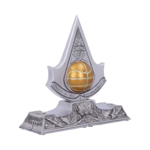 Assassin’s Creed Silver Emblem Sculpture - Golden Apple Orb Assassin’s Creed silver insignia sculpture with golden Apple of Eden orb on ornate base The-Hidden-Hatch