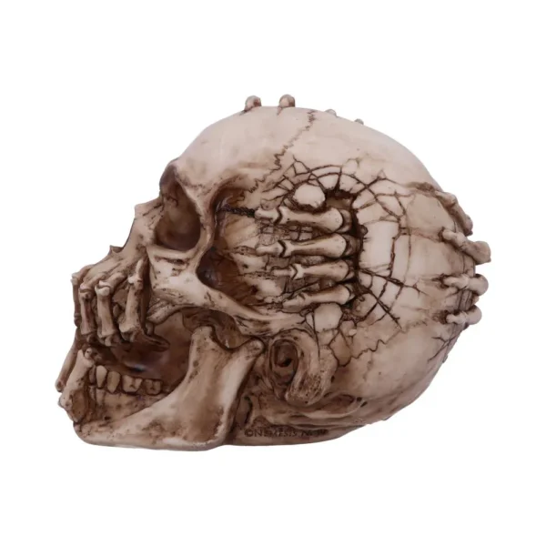 Human Skull Bone Sculpture Beige - Skeletal Hand Surreal Design A realistic aged skull sculpture with skeletal fingers gripping its temple in a surreal design.