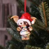 Gizmo Christmas Ornament Resin Figure - Tangled Colorful Lights Gizmo Christmas ornament tangled in colorful lights hanging on a green tree branch The-Hidden-Hatch