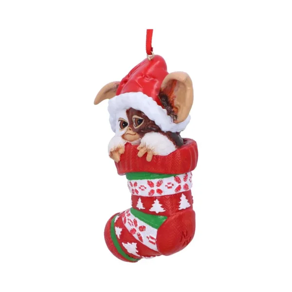 Gizmo Christmas ornament peeking from a red festive stocking with Santa hat The-Hidden-Hatch