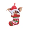 Gizmo Christmas ornament in a red festive stocking with Santa hat, holiday decoration The-Hidden-Hatch